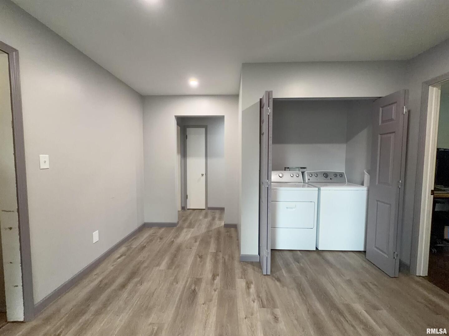 117 Marshall Place Carmi, IL 62821 - Photo 21 of 25 a view of empty room with wooden floor
