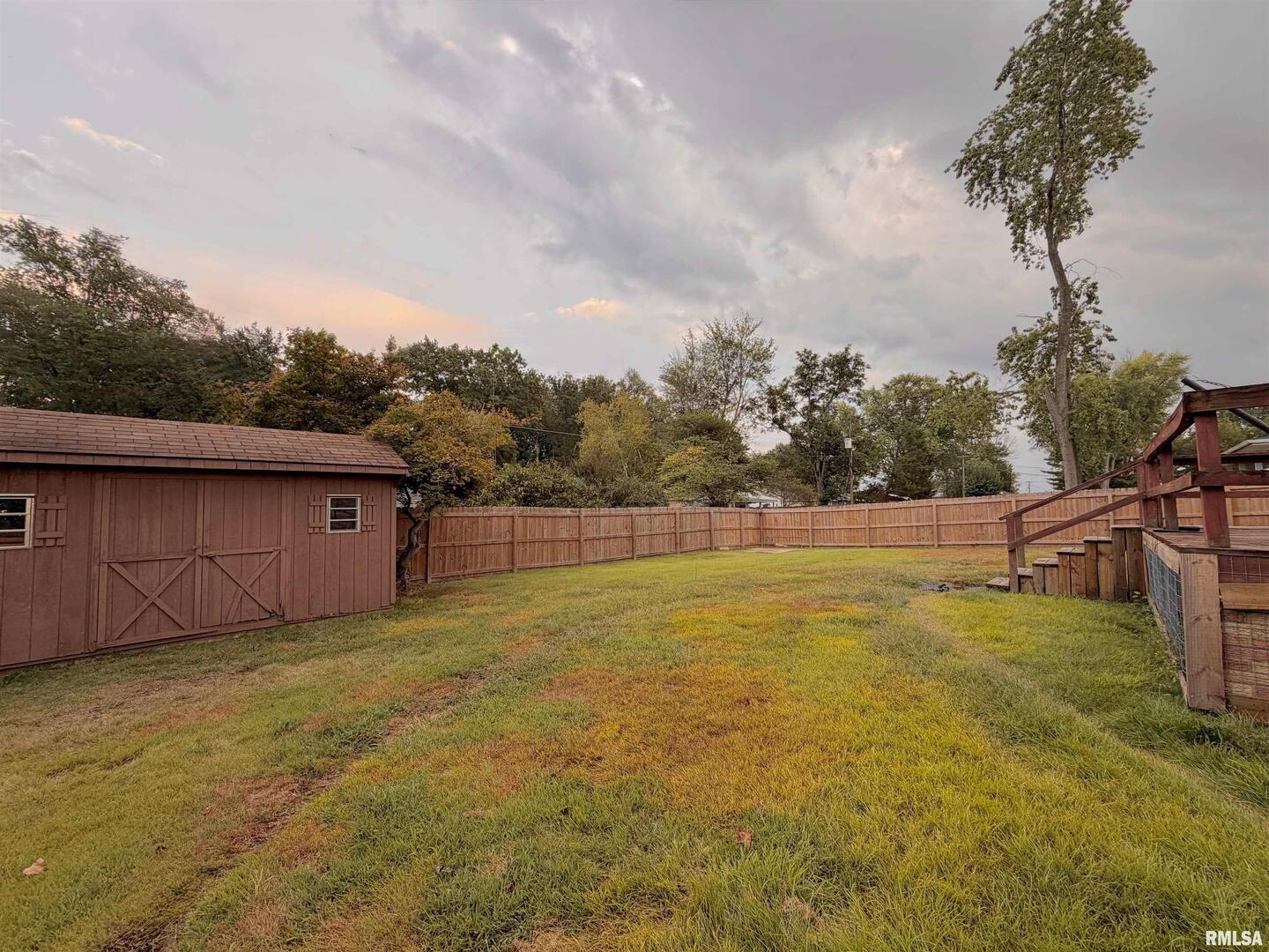 117 Marshall Place Carmi, IL 62821 - Photo 23 of 25 a view of a yard with an outdoor space