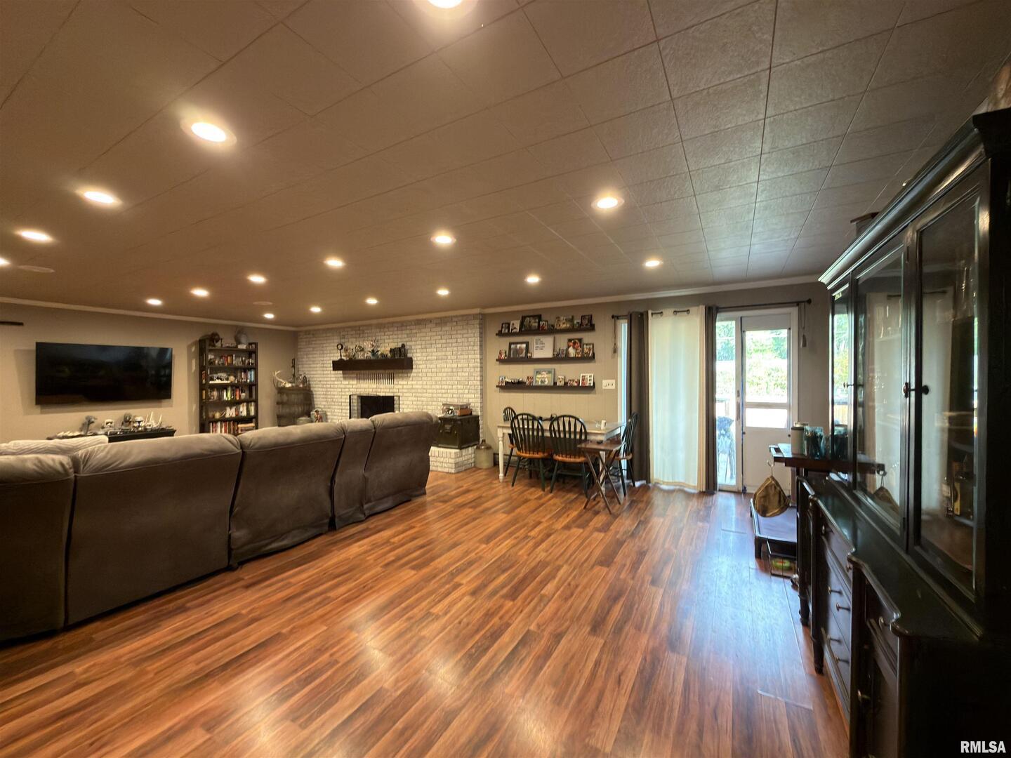 117 Marshall Place Carmi, IL 62821 - Photo 6 of 25 a living room with furniture and a flat screen tv