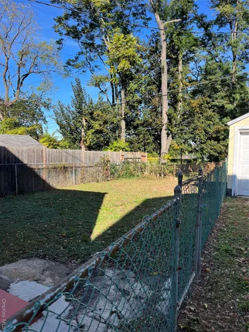 a view of a yard with an outdoor space
