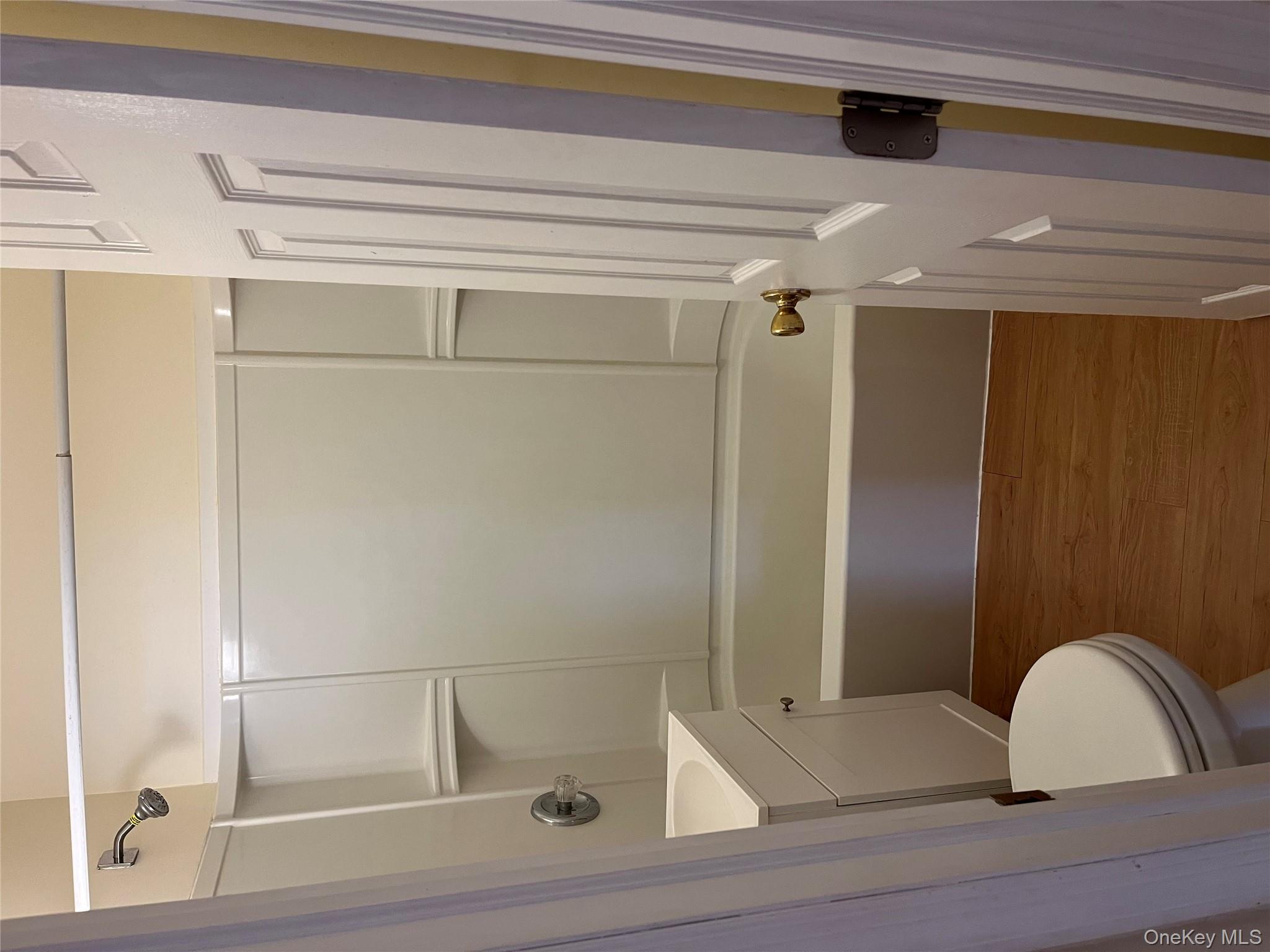 21 Vernon Terrace, Unit 1 Poughkeepsie, NY 12601 - Photo 20 of 23 a bathroom with a toilet and a shower