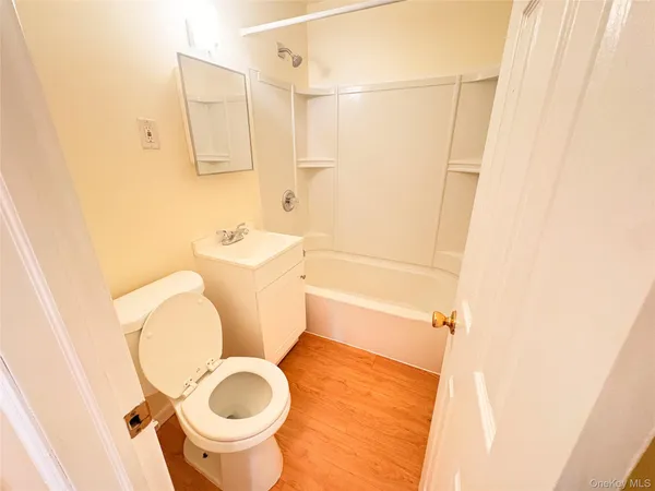 a bathroom with a toilet and a sink