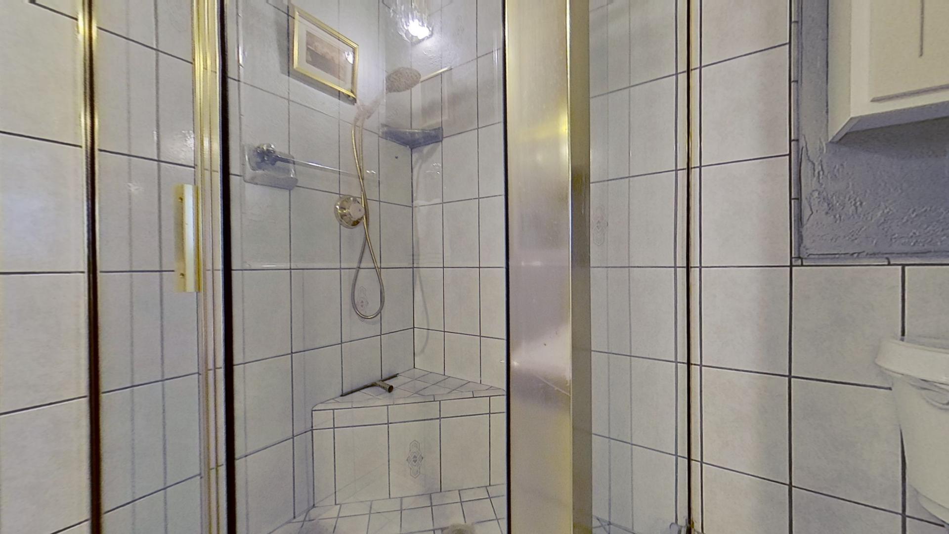 615 Eston Place Lancaster, CA 93535 - Photo 25 of 46 a bathroom with a shower