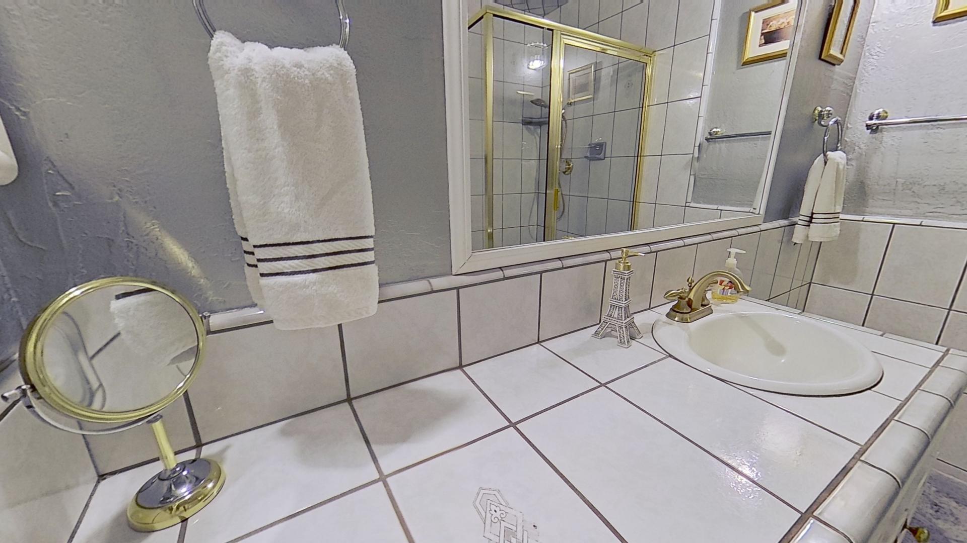 615 Eston Place Lancaster, CA 93535 - Photo 27 of 46 a bathroom with a sink and mirror