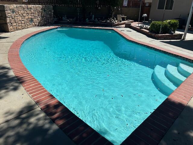 615 Eston Place Lancaster, CA 93535 - Photo 3 of 46 a view of swimming pool from a balcony