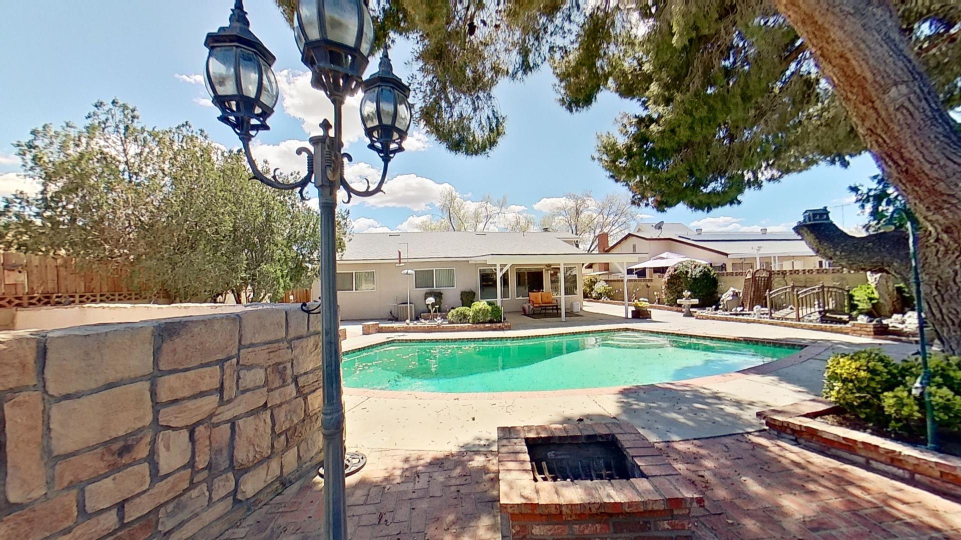 615 Eston Place Lancaster, CA 93535 - Photo 40 of 46 a front view of a house with garden