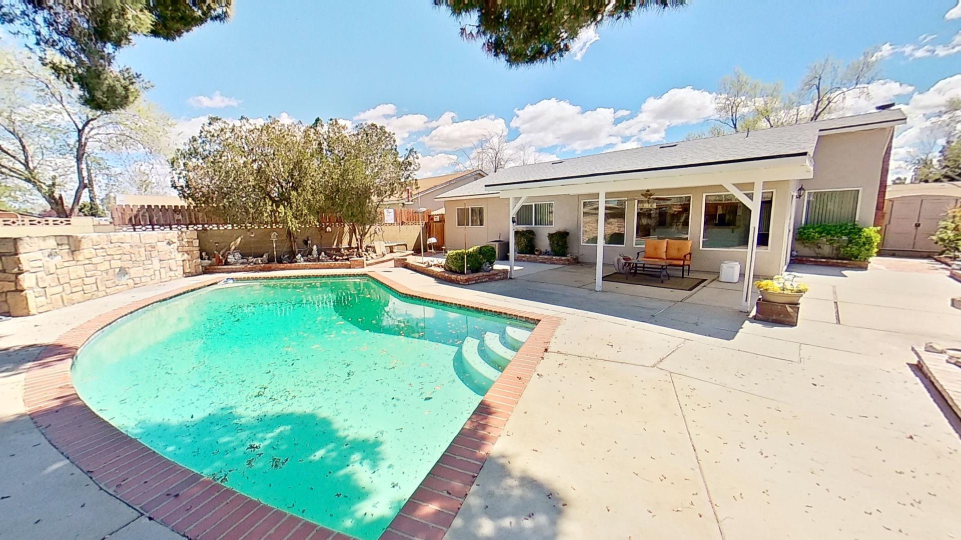 615 Eston Place Lancaster, CA 93535 - Photo 43 of 46 swimming pool view with a seating space