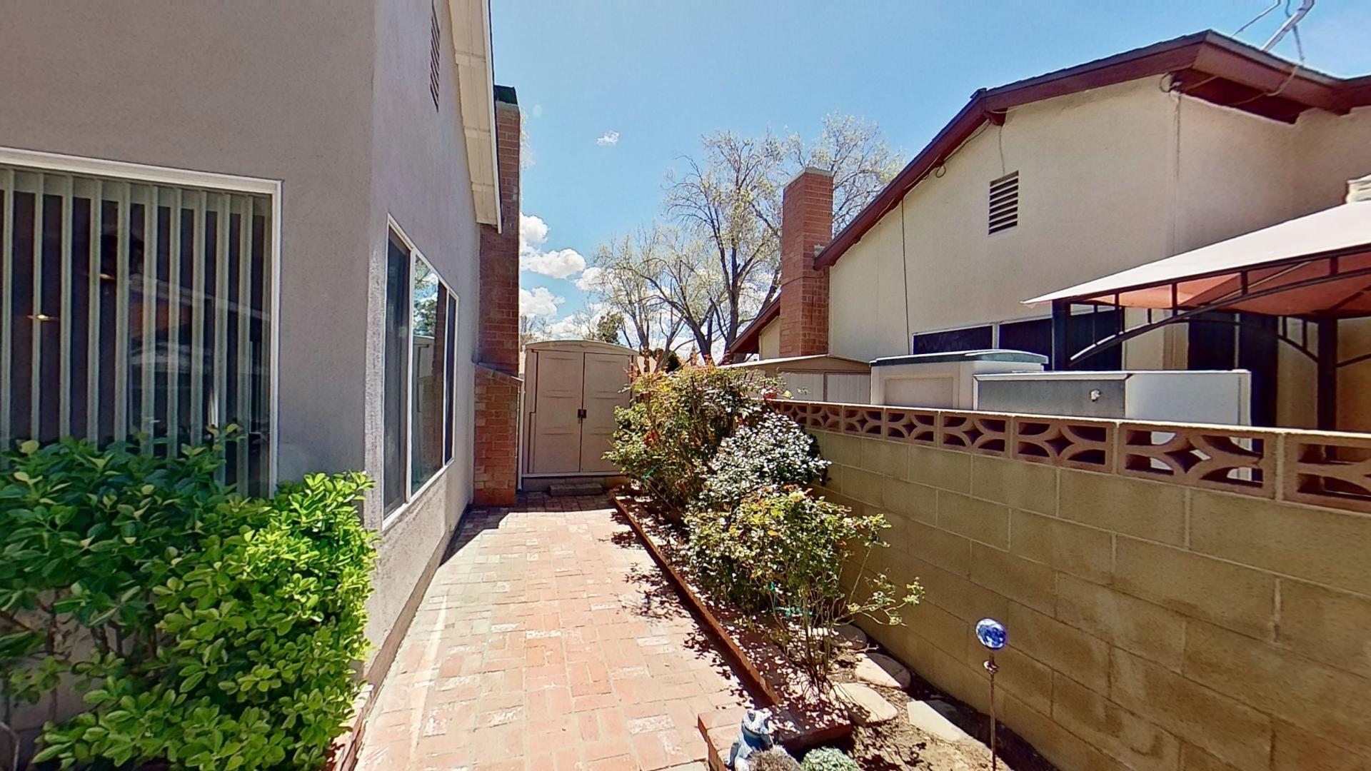 615 Eston Place Lancaster, CA 93535 - Photo 44 of 46 a view of a house with a yard