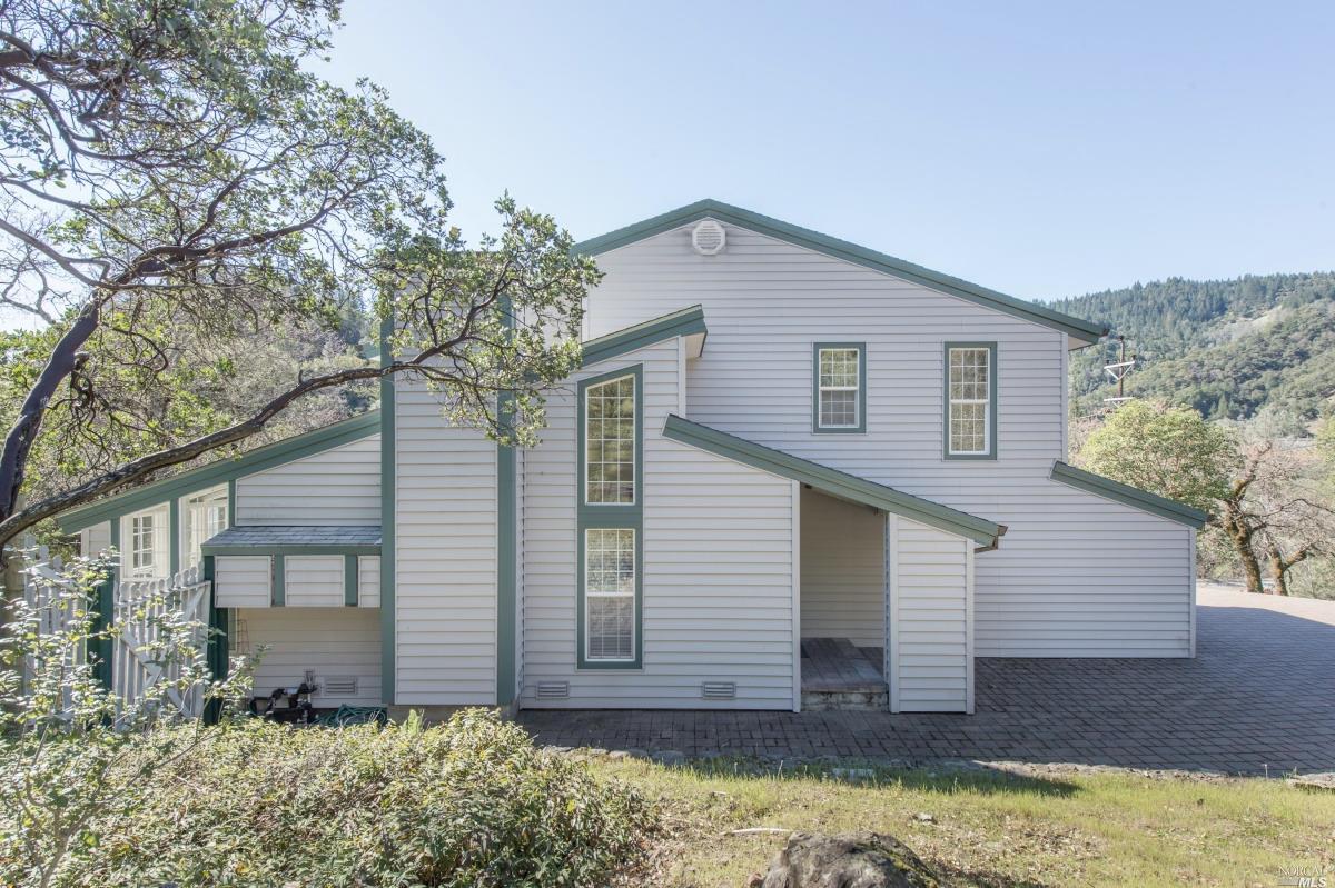 a front view of house with yard