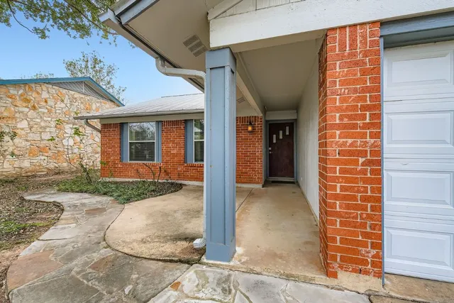 a view of a house with a porch