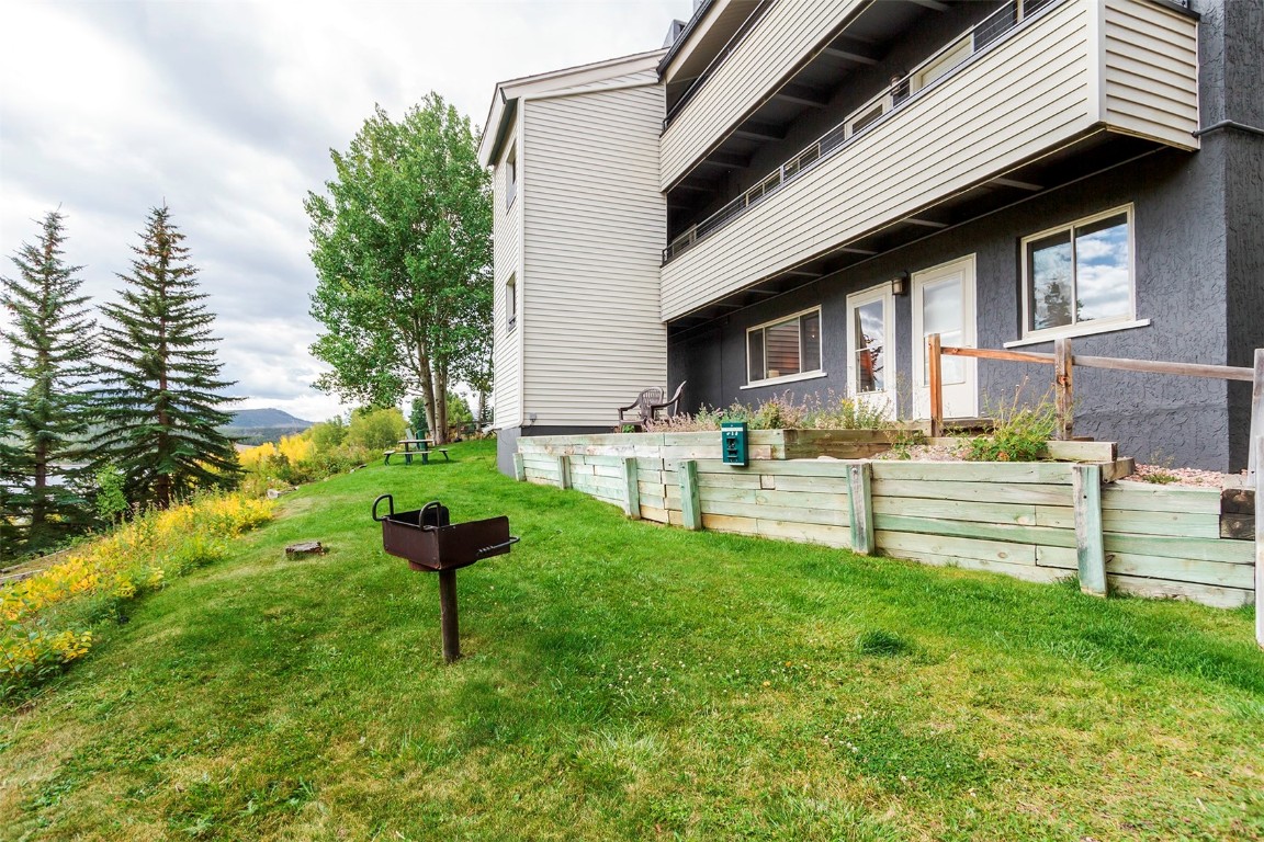 370 La Bonte Street, Unit F Dillon, CO 80435 - Photo 24 of 30 a garden with trees in front of it