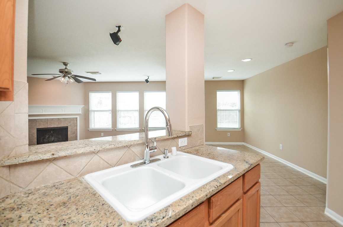 7134 Winston Ranch Parkway Richmond, TX 77406 - Photo 14 of 32 a bathroom with a sink double vanity and a mirror