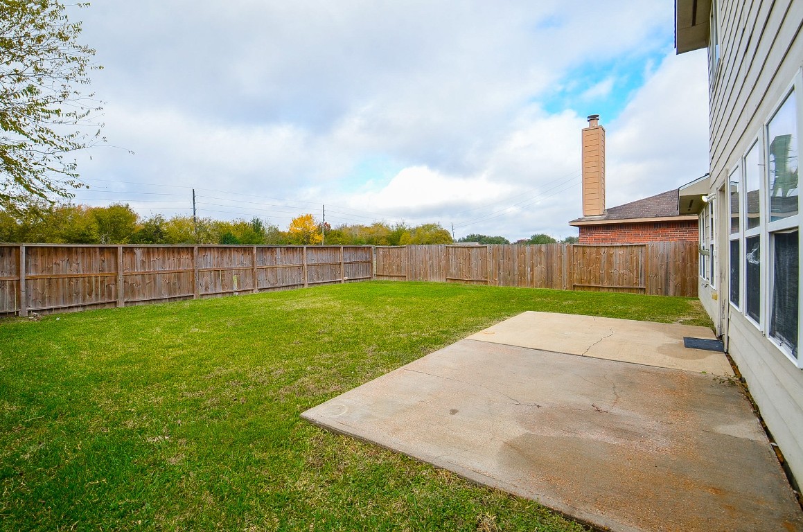 7134 Winston Ranch Parkway Richmond, TX 77406 - Photo 29 of 32 a view of a garden with a slide