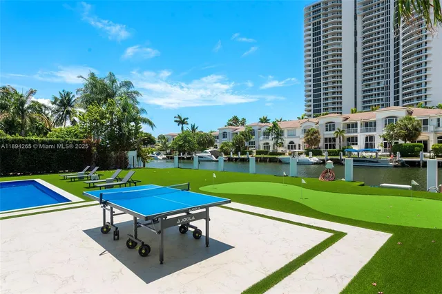 a view of an chairs and tables in the patio