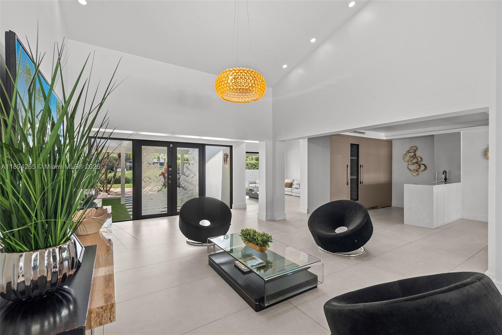 207 Holiday Drive Hallandale Beach, FL 33009 - Photo 31 of 50 a living room with furniture and a large window