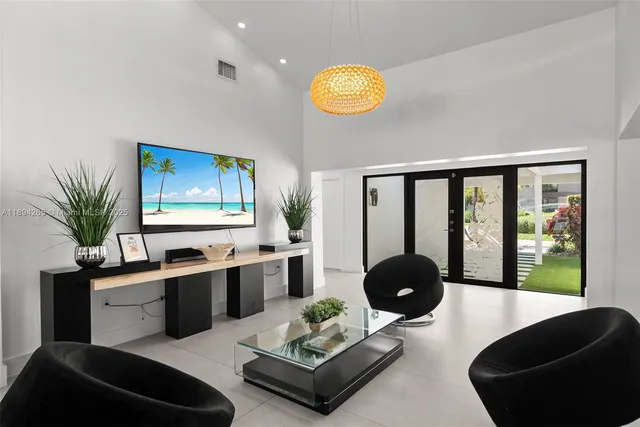 a room with a refrigerator and couch