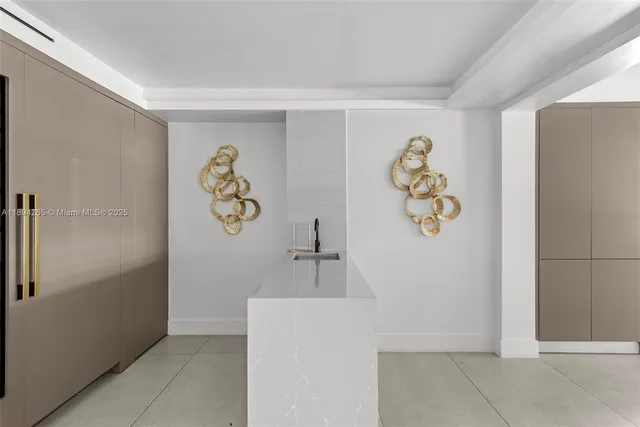 a spacious bedroom with a bed and glass window