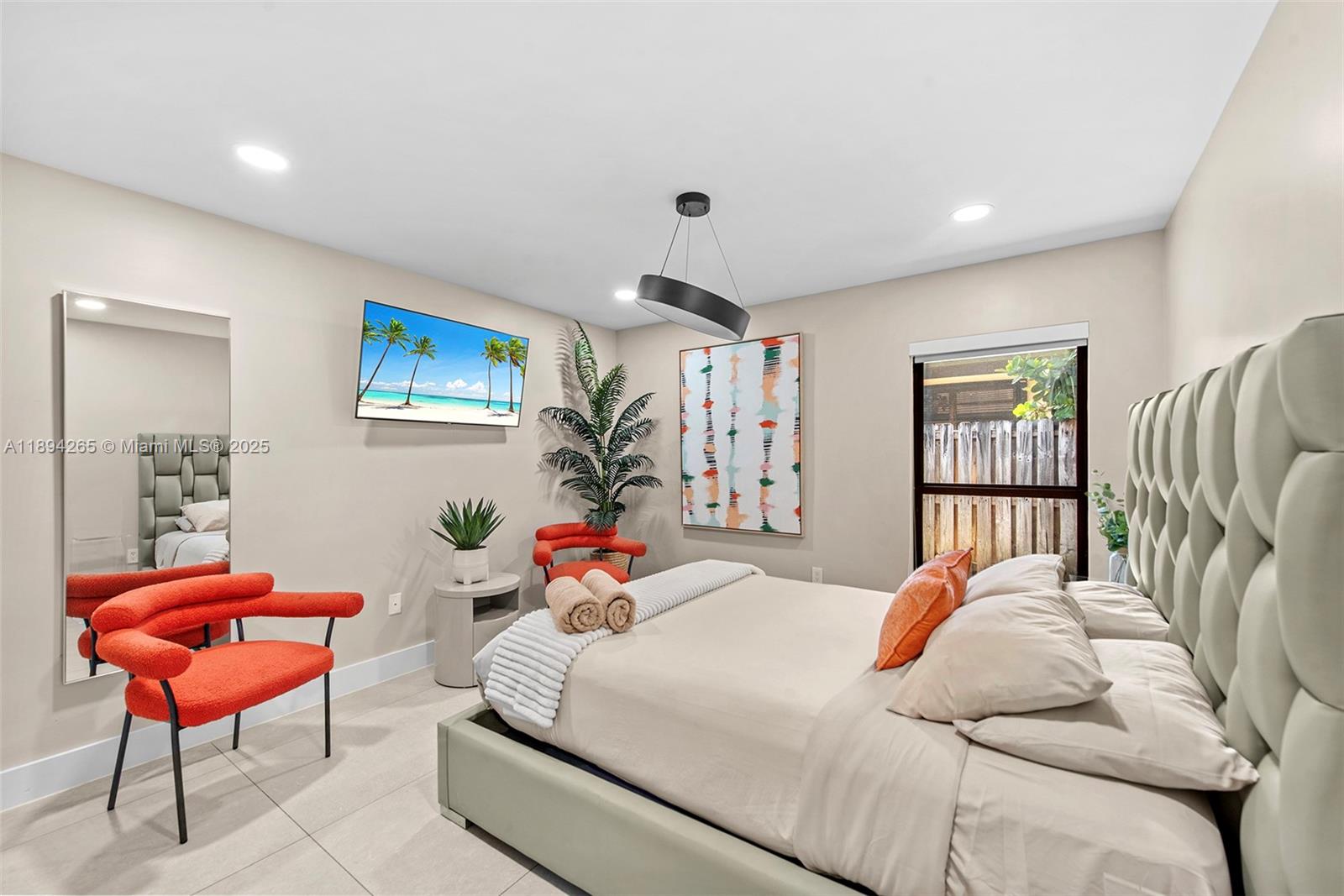 207 Holiday Drive Hallandale Beach, FL 33009 - Photo 42 of 50 a bedroom with furniture and a large window