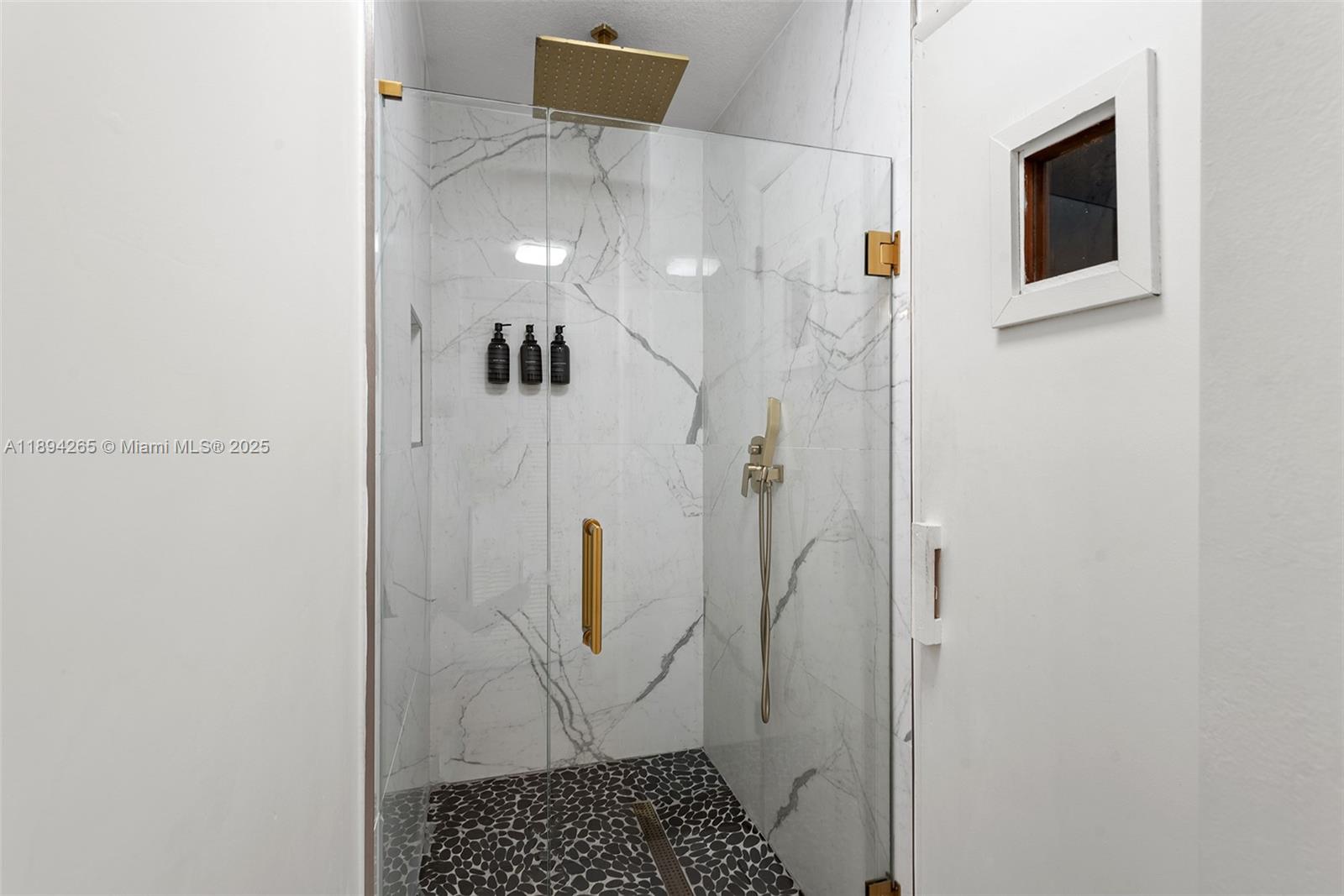 207 Holiday Drive Hallandale Beach, FL 33009 - Photo 47 of 50 a bathroom with a shower