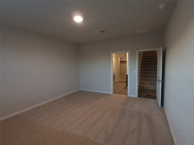 an empty room that has a window