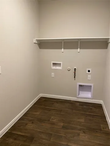 a white sink sitting next to a white toilet