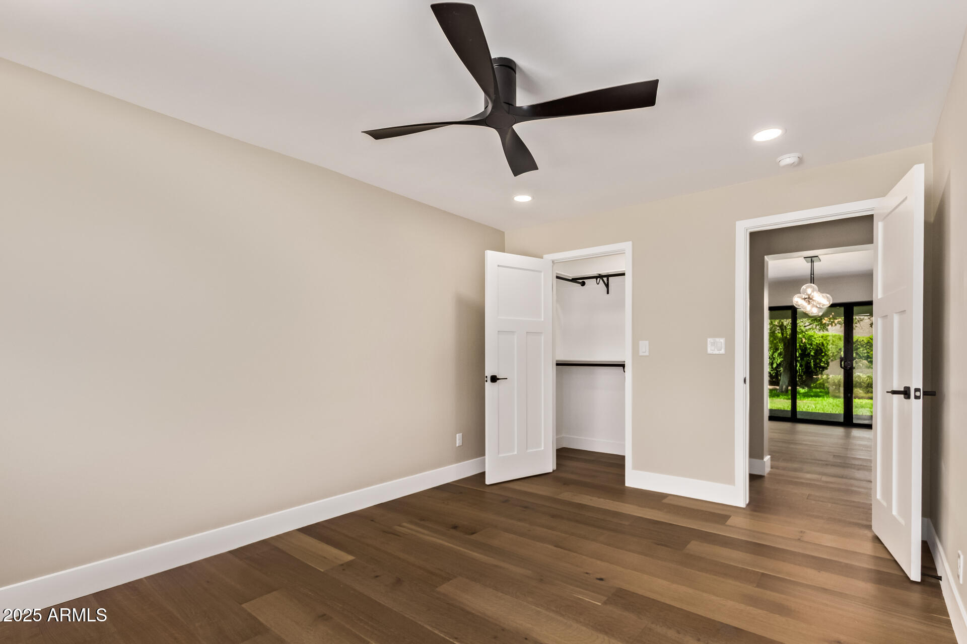 1540 West Lawrence Lane Phoenix, AZ 85021 - Photo 20 of 27 a view of empty room with wooden floor