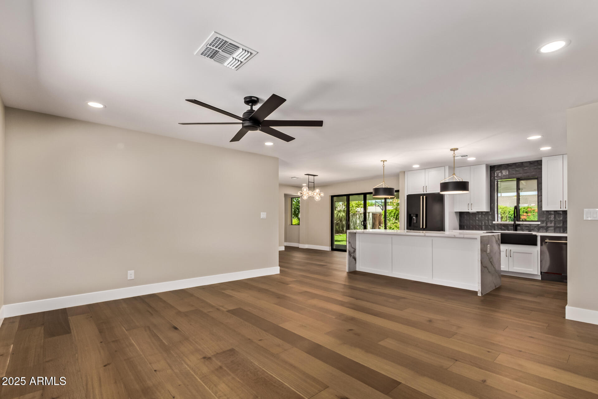 1540 West Lawrence Lane Phoenix, AZ 85021 - Photo 6 of 27 a view of kitchen with cabinets and wooden floor