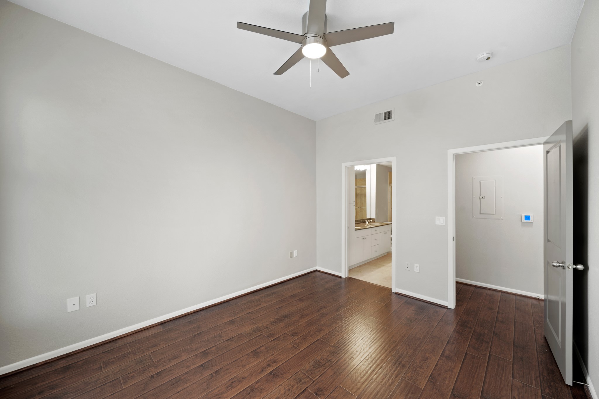 3505 Sage Road, Unit 1004 Houston, TX 77056 - Photo 12 of 17 a view of empty room with wooden floor