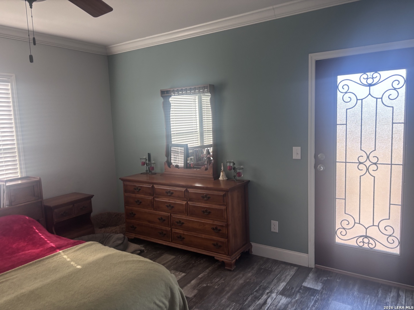 761 Baker Street Seguin, TX 78155 - Photo 14 of 19 a bedroom with a bed and a window