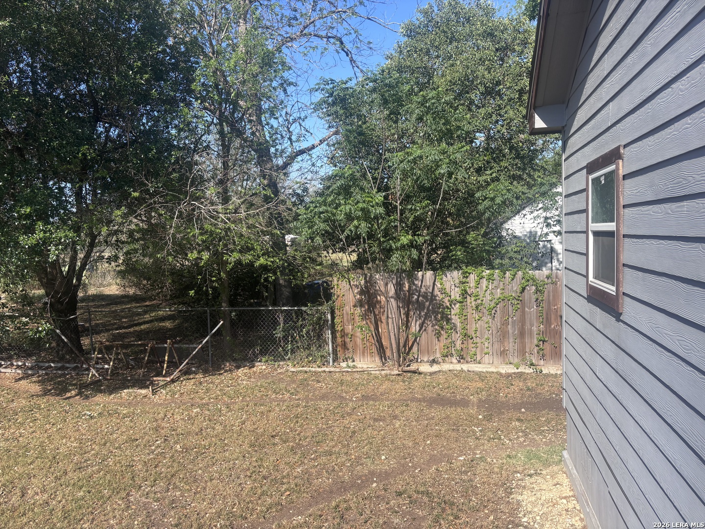 761 Baker Street Seguin, TX 78155 - Photo 19 of 19 a backyard of a house with lots of green space