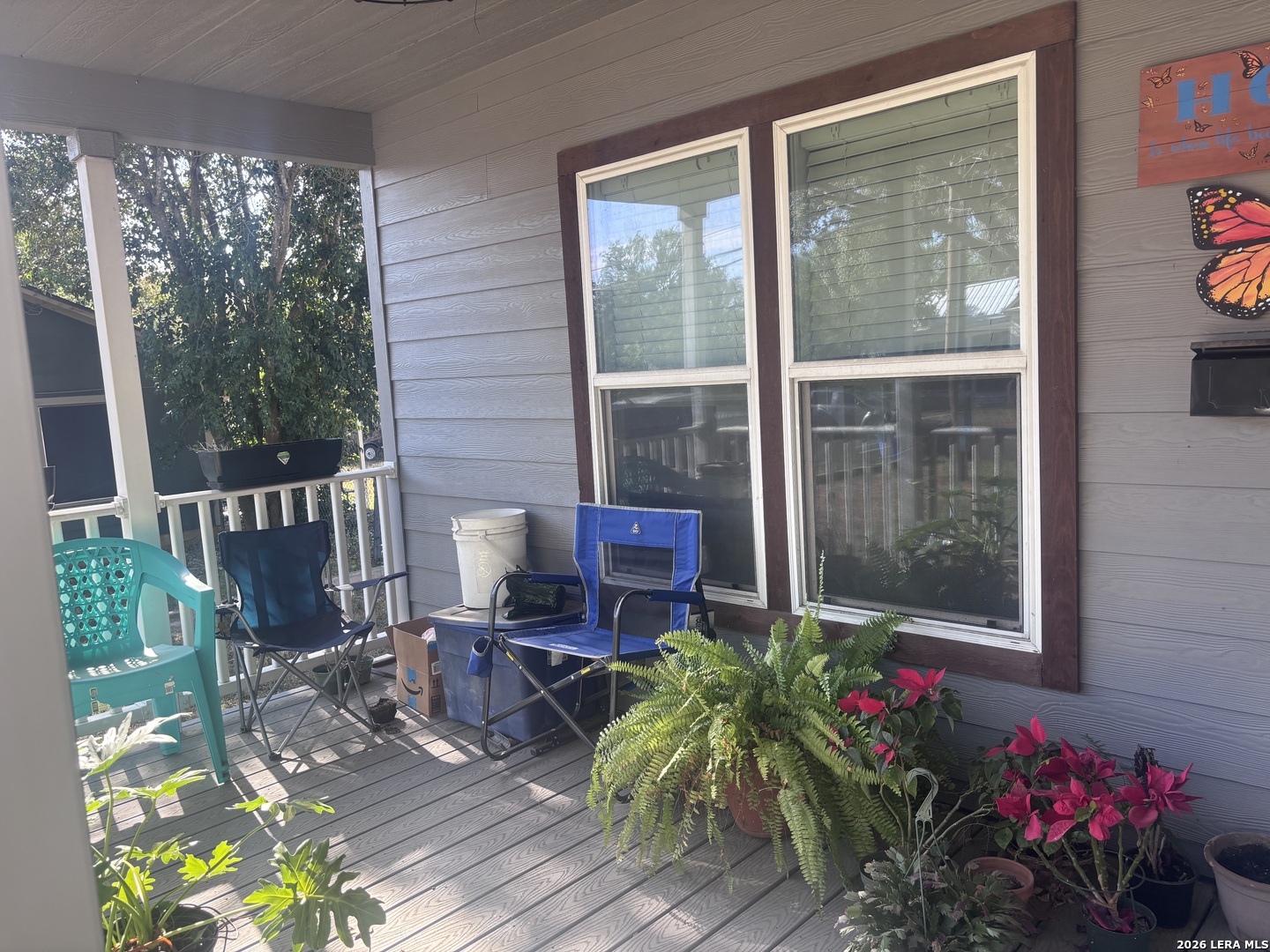 761 Baker Street Seguin, TX 78155 - Photo 3 of 19 a view of a porch with chairs and potted plants