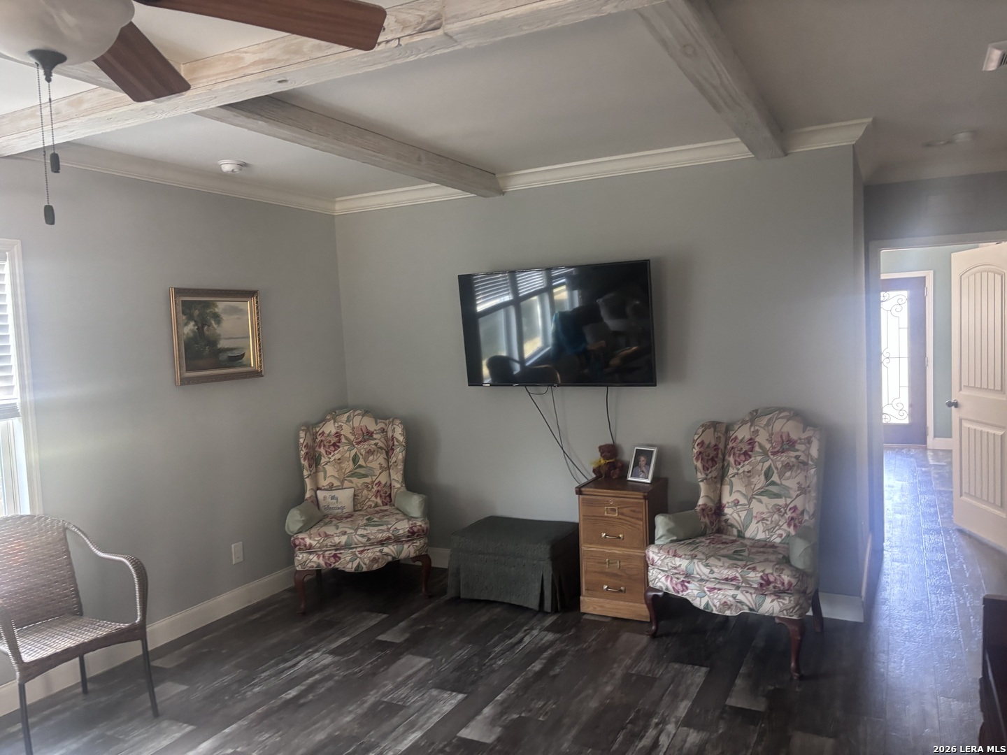 761 Baker Street Seguin, TX 78155 - Photo 7 of 19 a living room with furniture and a flat screen tv