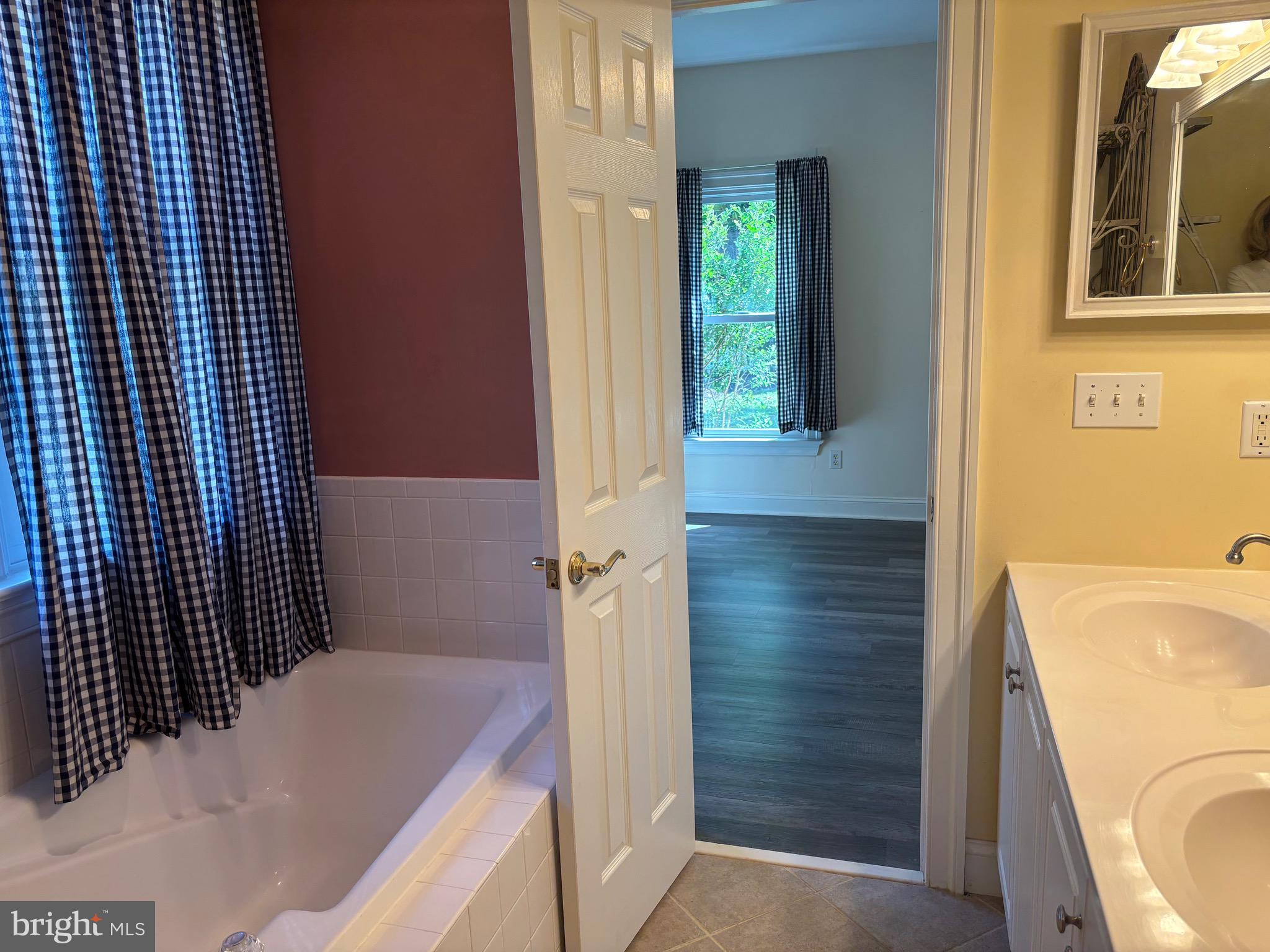 629 Country Club Road Culpeper, VA 22701 - Photo 15 of 27 a bathroom with a sink and a mirror