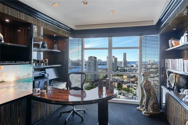 a bathroom with double vanity and a shower