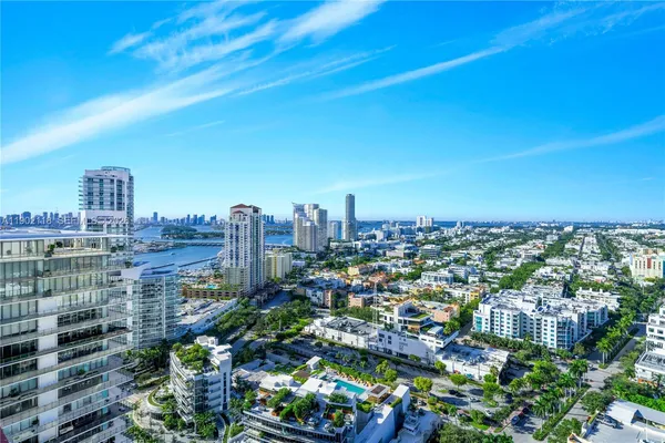 a view of a city with tall buildings