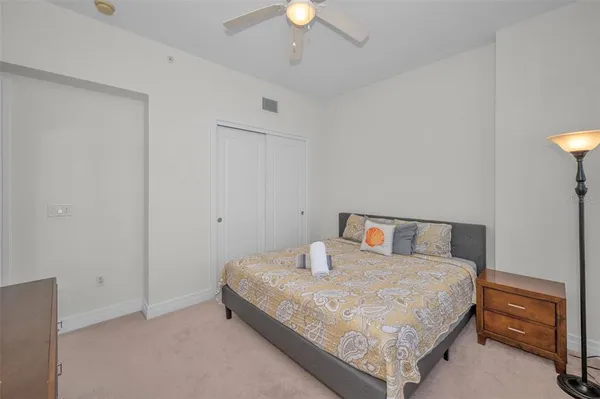 a view of swimming pool with outdoor seating and city view