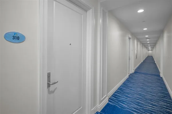 a living room with furniture fireplace and a flat screen tv