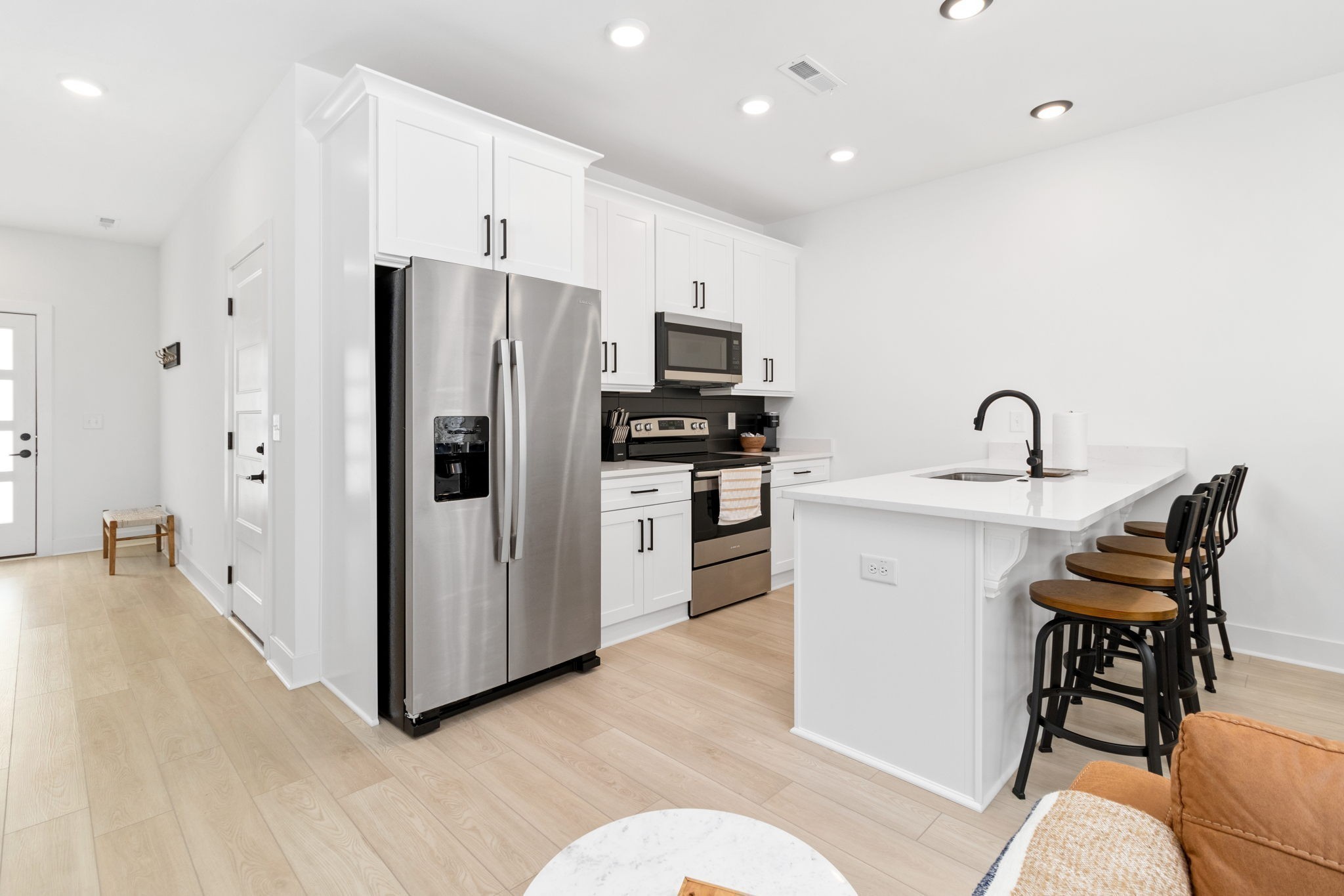 725 Hornbuckle Road, Unit K2 Clarksville, TN 37043 - Photo 13 of 31 a kitchen with stainless steel appliances granite countertop a refrigerator and a stove top oven