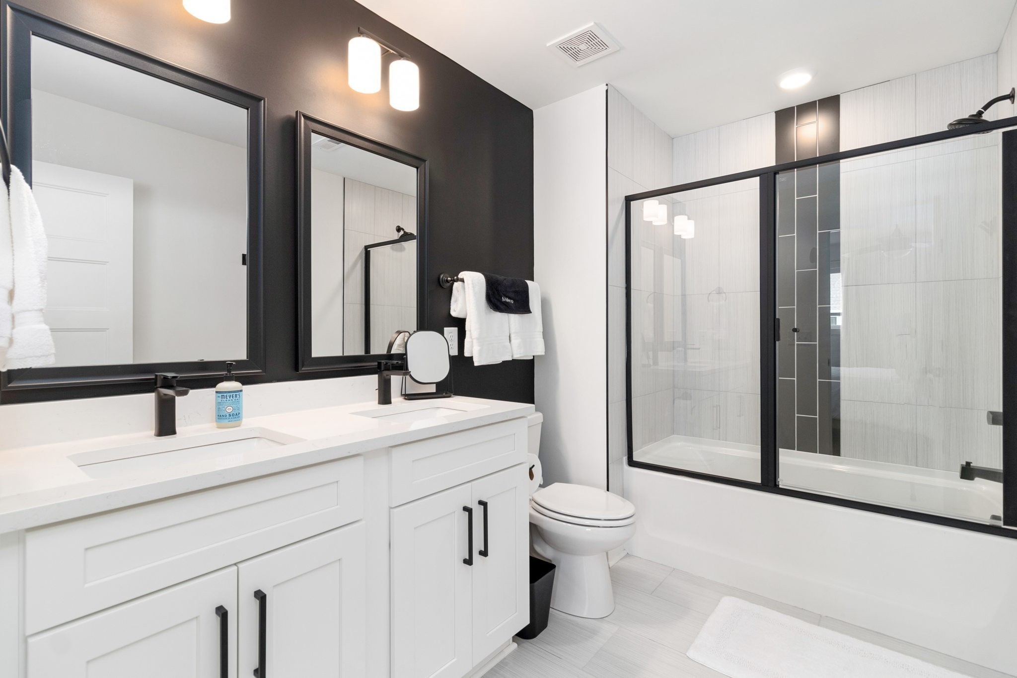 725 Hornbuckle Road, Unit K2 Clarksville, TN 37043 - Photo 21 of 31 a bathroom with a toilet a sink and a large mirror