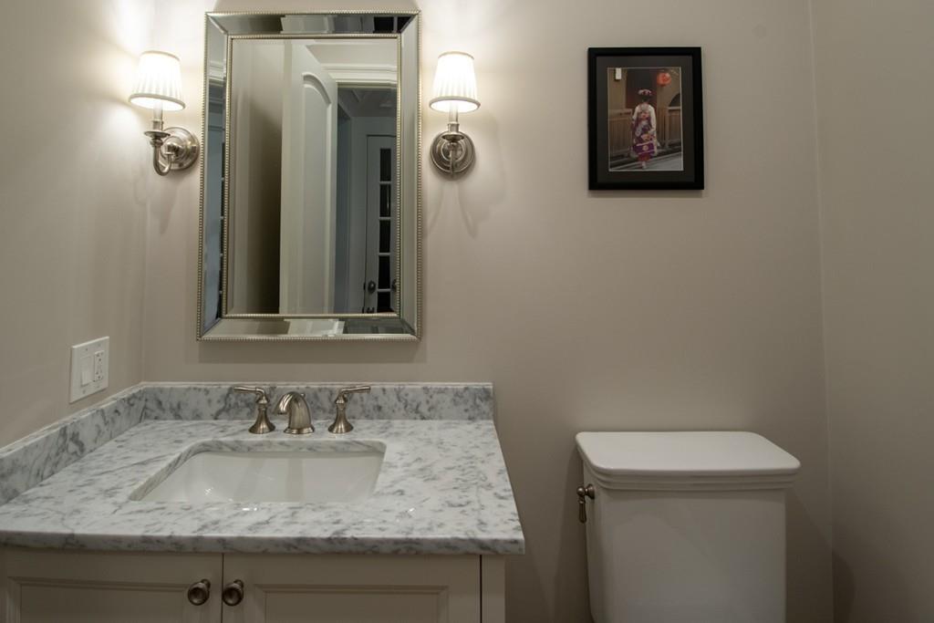 49 Bristol Road Wellesley, MA 02481 - Photo 13 of 30 a bathroom with a granite countertop sink and a mirror