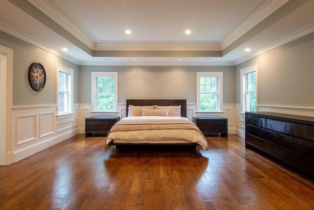 49 Bristol Road Wellesley, MA 02481 - Photo 15 of 30 a spacious bedroom with a bed and a large window