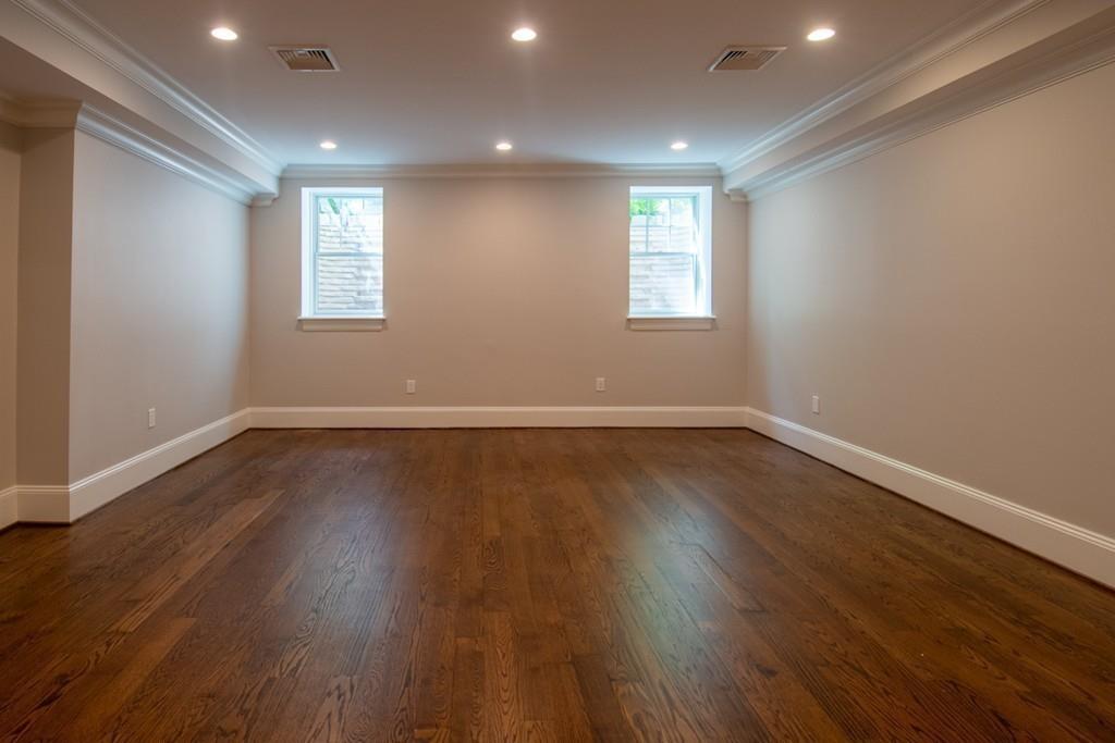 49 Bristol Road Wellesley, MA 02481 - Photo 23 of 30 a view of empty room with wooden floor and fan