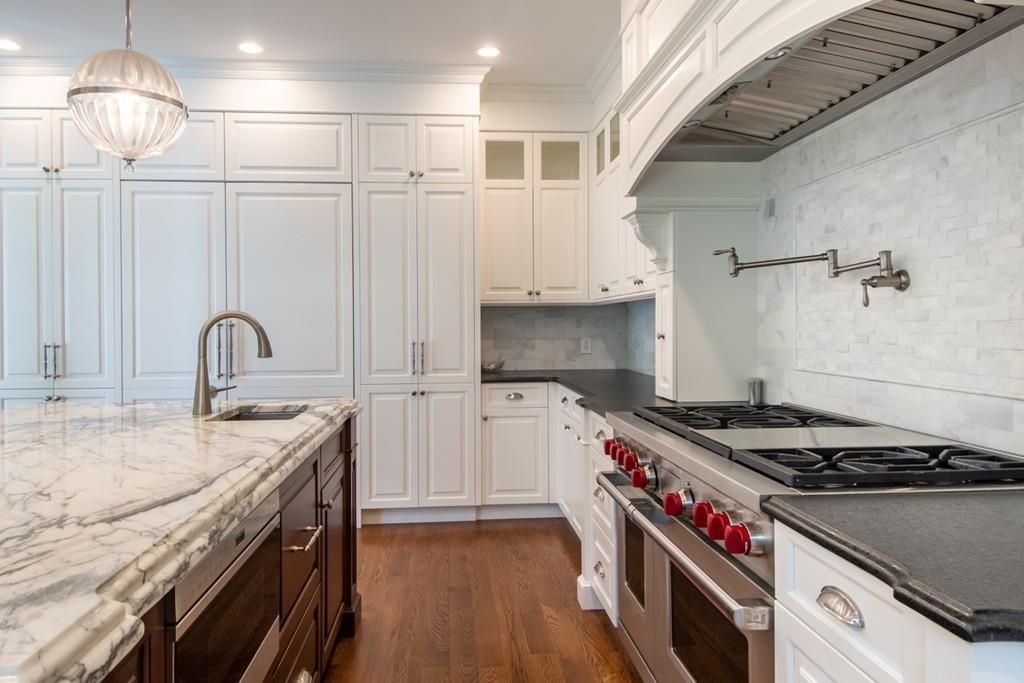 49 Bristol Road Wellesley, MA 02481 - Photo 4 of 30 a kitchen with granite countertop a stove and a sink