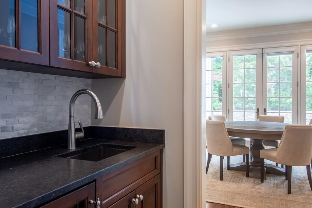 49 Bristol Road Wellesley, MA 02481 - Photo 8 of 30 a close view of a sink a counter and dining room