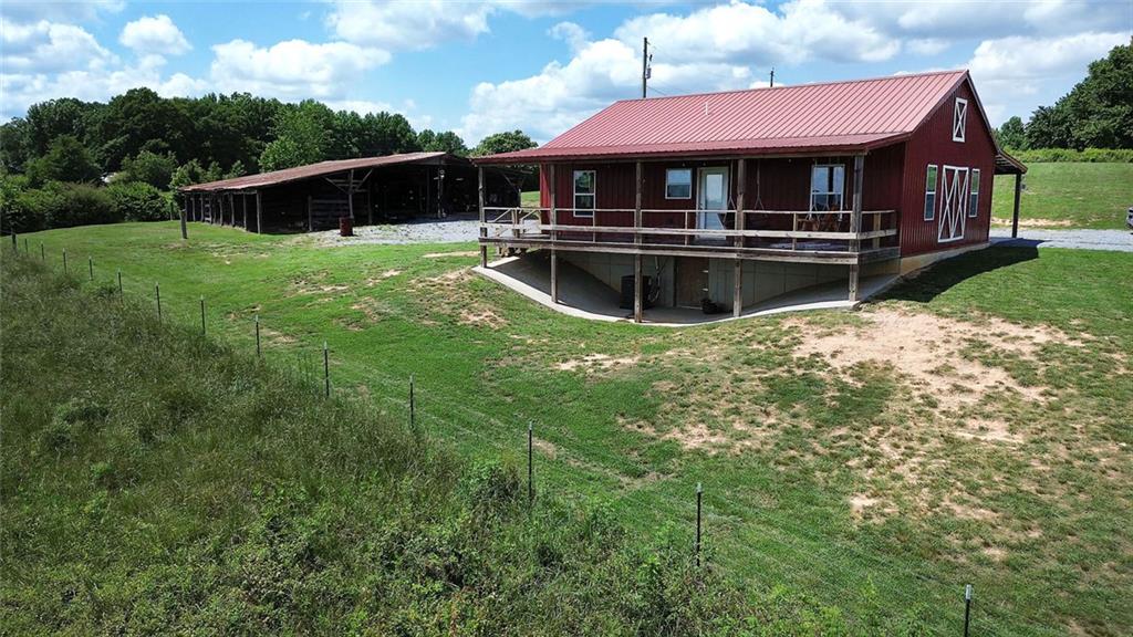 765 Addison Road Buchanan, GA 30113 - Photo 30 of 50 a view of a house with pool