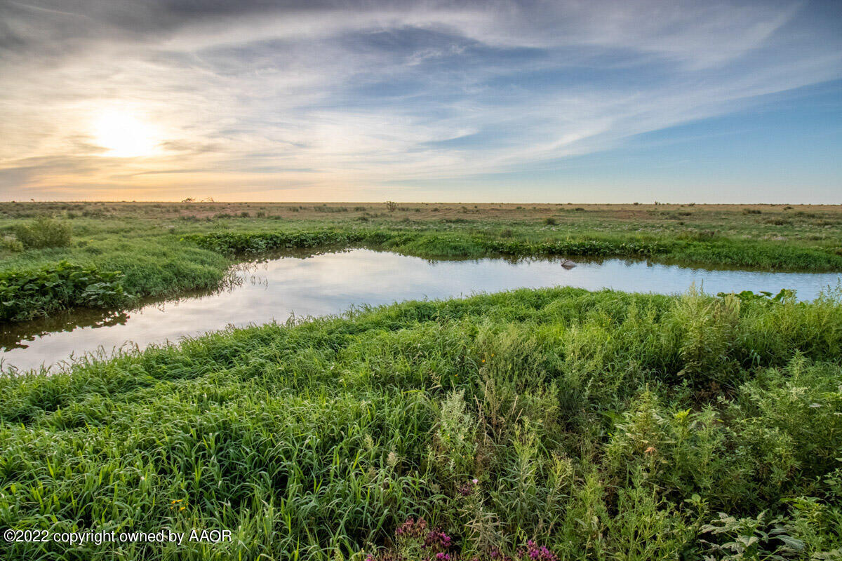 Cemetery Road Canyon, TX 79015 - Photo 21 of 47 a view of a lake from a yard