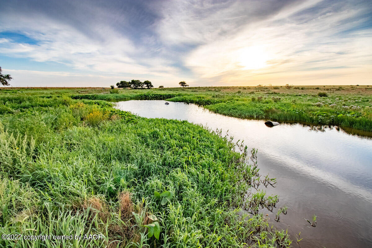 Cemetery Road Canyon, TX 79015 - Photo 22 of 47 a view of a lake with a big yard