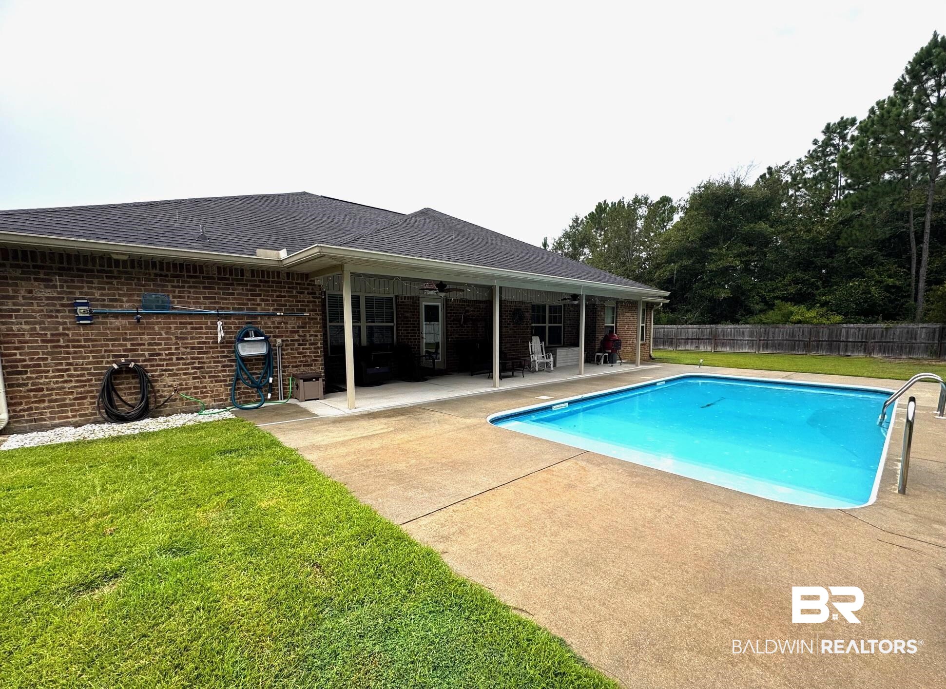 10257 Lyttleton Loop Lillian, AL 36549 - Photo 26 of 31 View of swimming pool with a patio area and ceiling fan