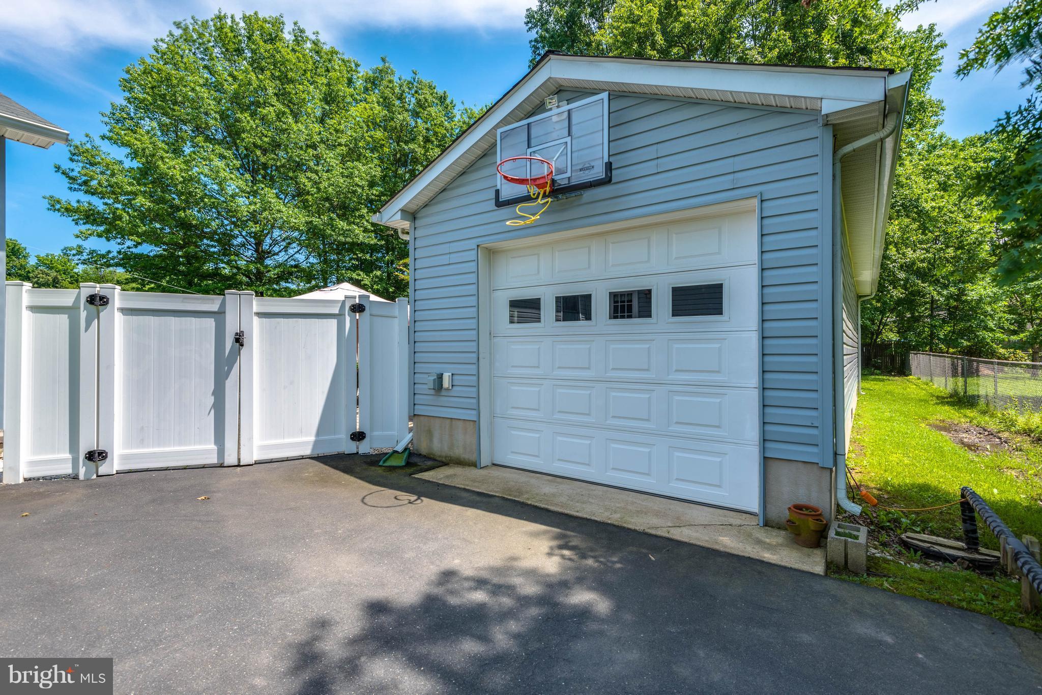 203 Ackerman Road Stevensville, MD 21666 - Photo 4 of 30 OVERSIZED Garage with doors opening on both sides