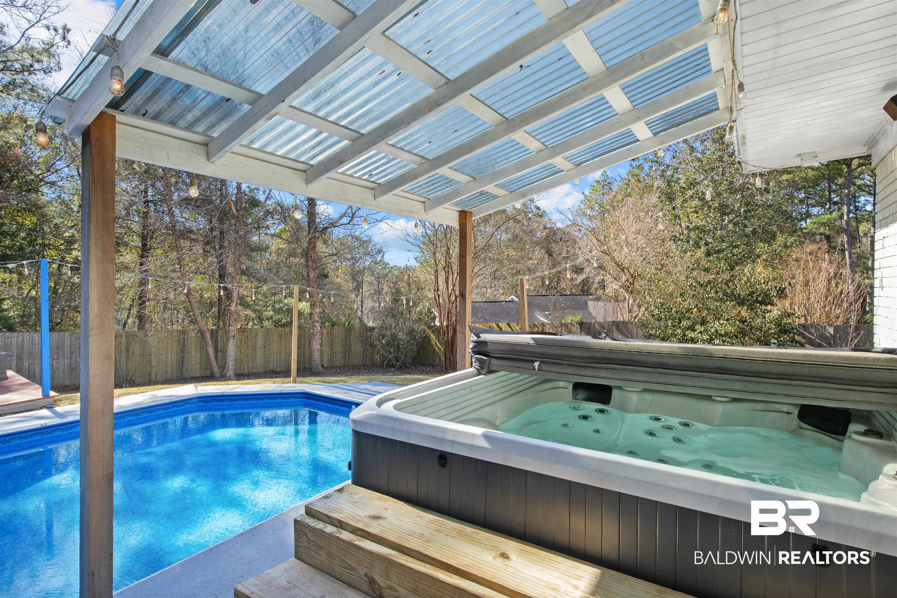 131 Marikesh Drive Daphne, AL 36526 - Photo 24 of 29 View of swimming pool featuring a hot tub and a pergola